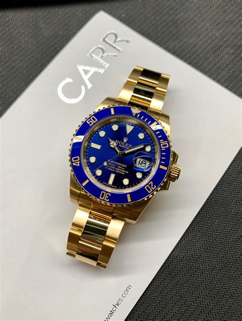 solid gold rolex submariner.